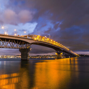 Auckland Harbour Bridge lit up at night