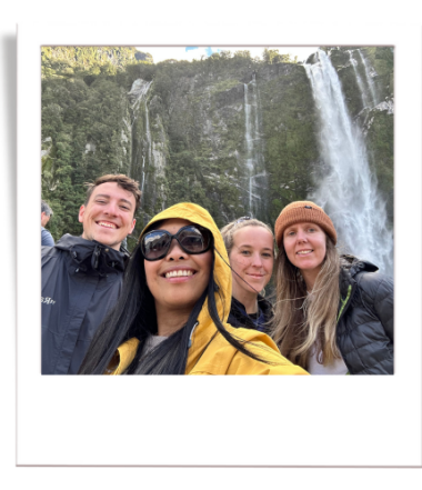 New Zealand Fine Touring employees visiting Milford Sound