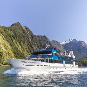 Real Journeys boat exploring Milford Sound, New Zealand South Island
