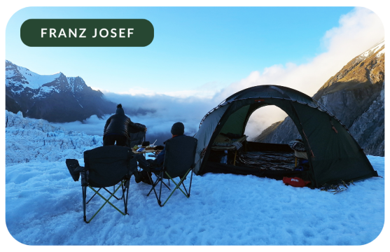 A couple camping on New Zealand's famous Franz Josef Glacier