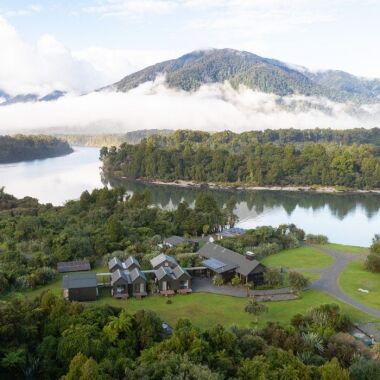 Lodge in green fiordland countryside