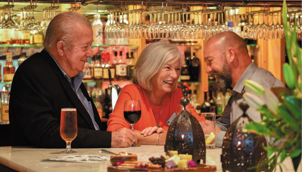 New Zealand Guided Coach Tour Seniors Connecting with Locals
