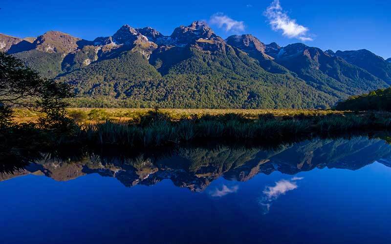 Beautiful mirror lakes on the road to Milford