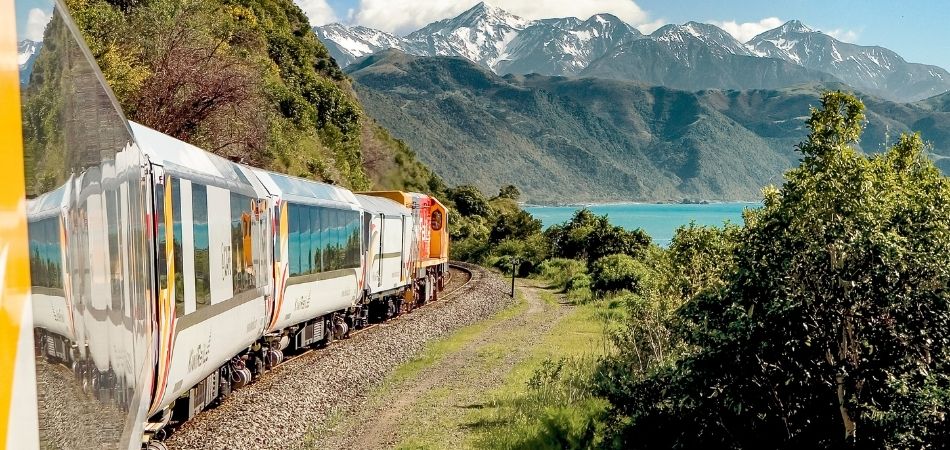 Coastal Pacific Train with mountain scenery