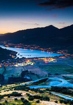 View of Queenstown from the Crown Range at sunset