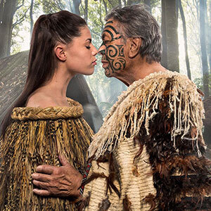 Maori woman and man in Tamaki Maori village, New Zealand