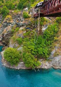 A man bungee jumping off Kawarau Bridge near Queenstown