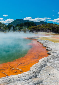 Image of ornage and blue Champagne thermal pool near Rotorua