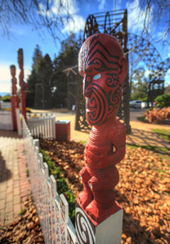 Traditional carvings at entrance to park in Rotorua