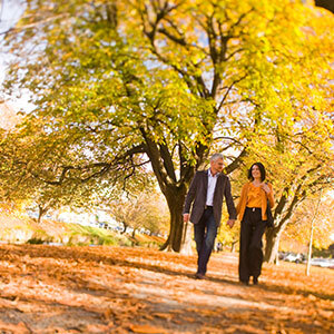 Couple walking in Hagley Park in Christchurch