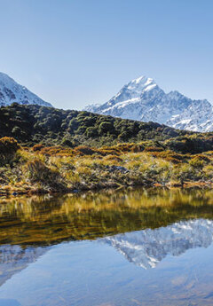 View across a lake to Mount Cook