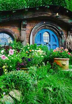 Hobbit home with blue doors in Hobbiton, near Matamata