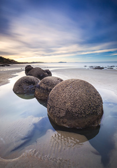 Image of Moeraki Boulders laying on the beach near Moeraki village