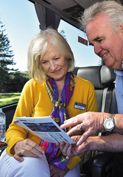 Coach driver, explaining the tour