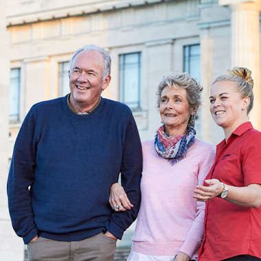 AAT Kings guide with couple at Auckland Museum