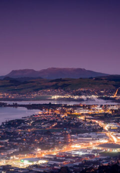 Rotorua at twilight with lights illumunating the darkness