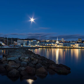 City lights over Wellington Harbour in the evening