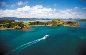 Boat sailing toward Bay of Islands