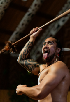 Māori performer doing a pūkana during the haka