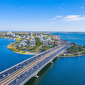 Aerial view of highway to South Perth, surrounded by water