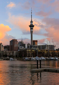 Image of Auckland Harbour and the Sky Tower at dusk