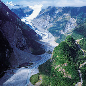 View of Fox Glacier framed by mountains
