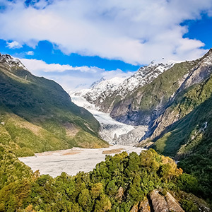 View of Franz Josef glacier and snowy mountains