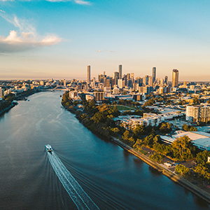 The Brisbane River at sunset with Brisbane City seen in the background