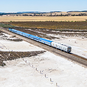 The Overland train crossing barren salt flats in South Australia
