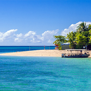 View of a boat heading towards Green Island in the Coral sea