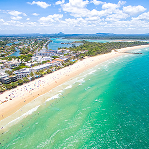 Aerial view of Golden Noosa Beach and turquoise waters of the Pacific Ocean
