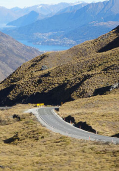 Winding road over the Crown Range towards Queenstown