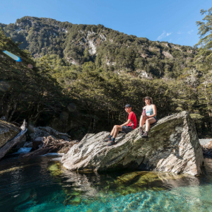 A couple resting on Routeburn Track