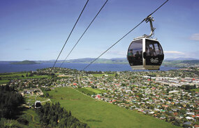 Gondola rising up of the hill toward Skyline Rotorua