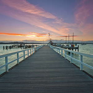 Image of a wharf in Russell during sunset