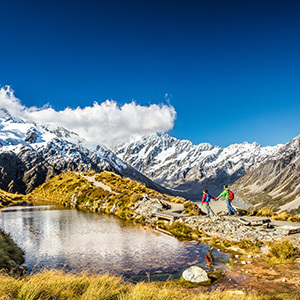 Couple hiking in Mt Cook National Park, New Zealand