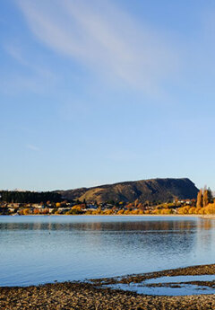 Wanaka Lake with Mount Iron in the background, a hill central to town that locals frequently walk