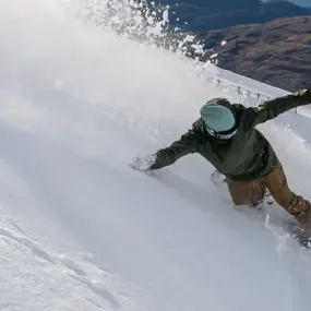 Snowboarder in the fresh snow