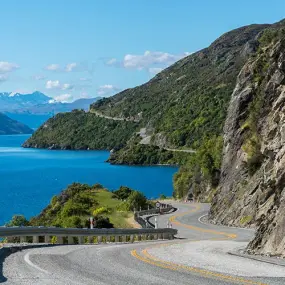 South Island New Zealand winding road along lake edge