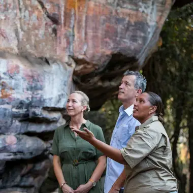 People looking at Rock art at Ubirr in Kakadu National Park. Credit Helen Orr & Tourism Northern Territory