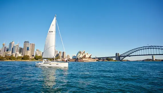 Sailboat with Sydney Harbour Bridge & Sydney Opera House behind