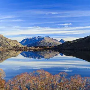 Mirrored mountains on Lake Hayes in Queenstown