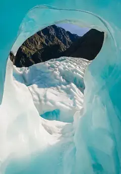 Image of ice and rock at the back at Fox Glacier, New Zealand