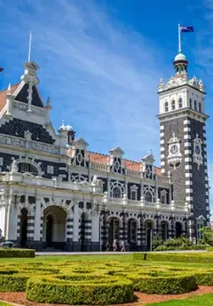 Image of Dunedin Railway Station on a sunny day