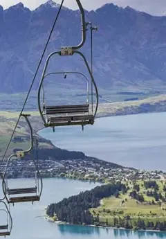 Image of a chairlift over Lake Wakatipu and Queenstown