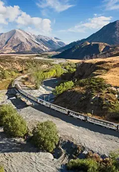 TranzAlpine Scenic Train travelling through the mountains