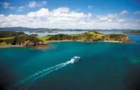 Boats travelling through the Bay of Islands