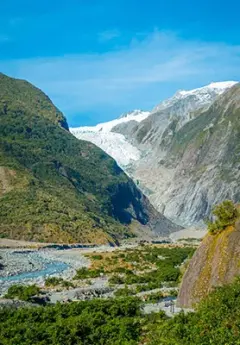 View of Franz Josef Glacier framed by hills