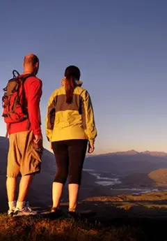 A couple enjoying a view of Queenstown