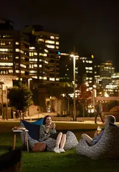 Couple enjoying a drink in Wellington in the evening